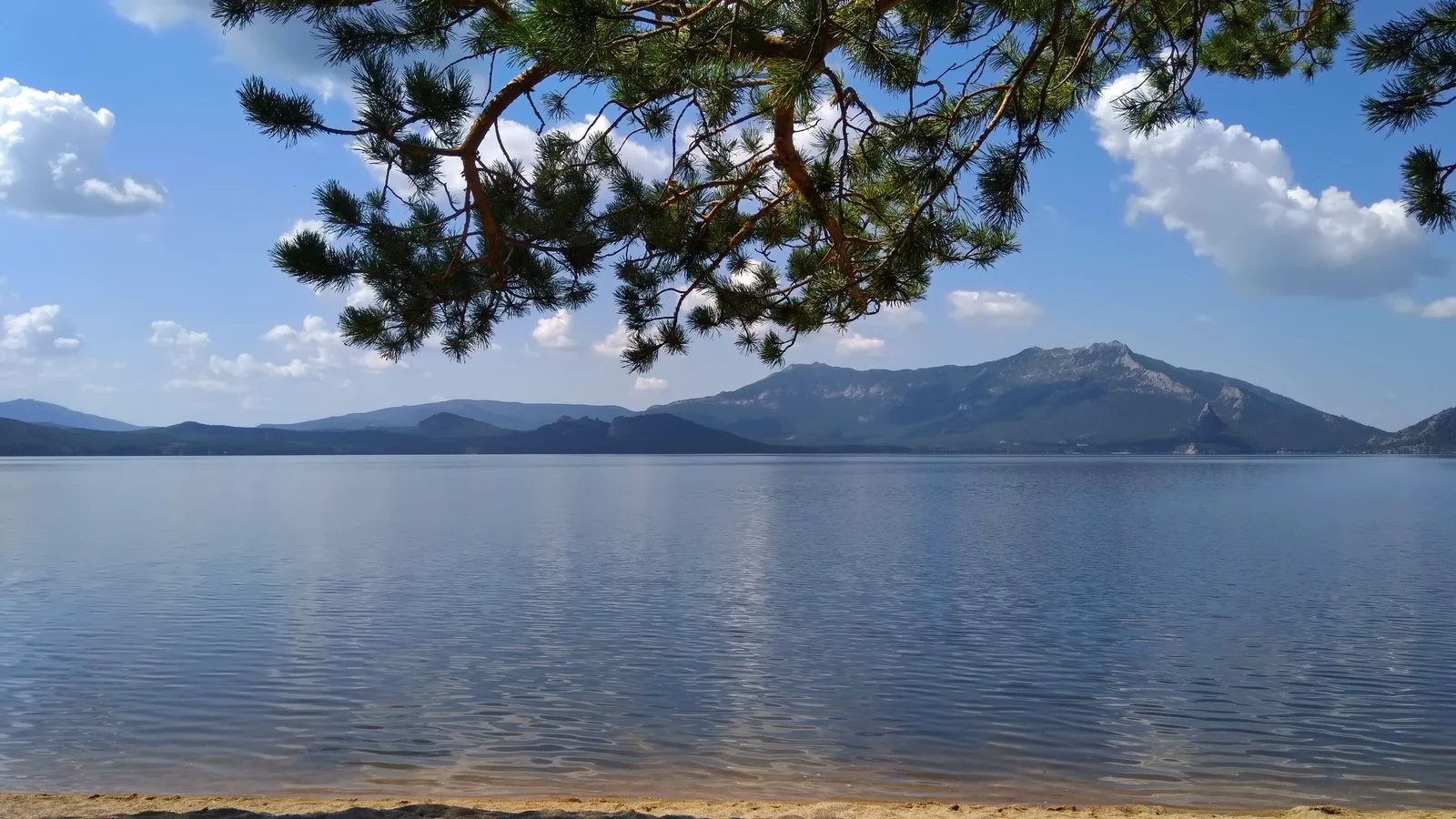 Lake Borovoe and Mount Kokshetau on a still morning